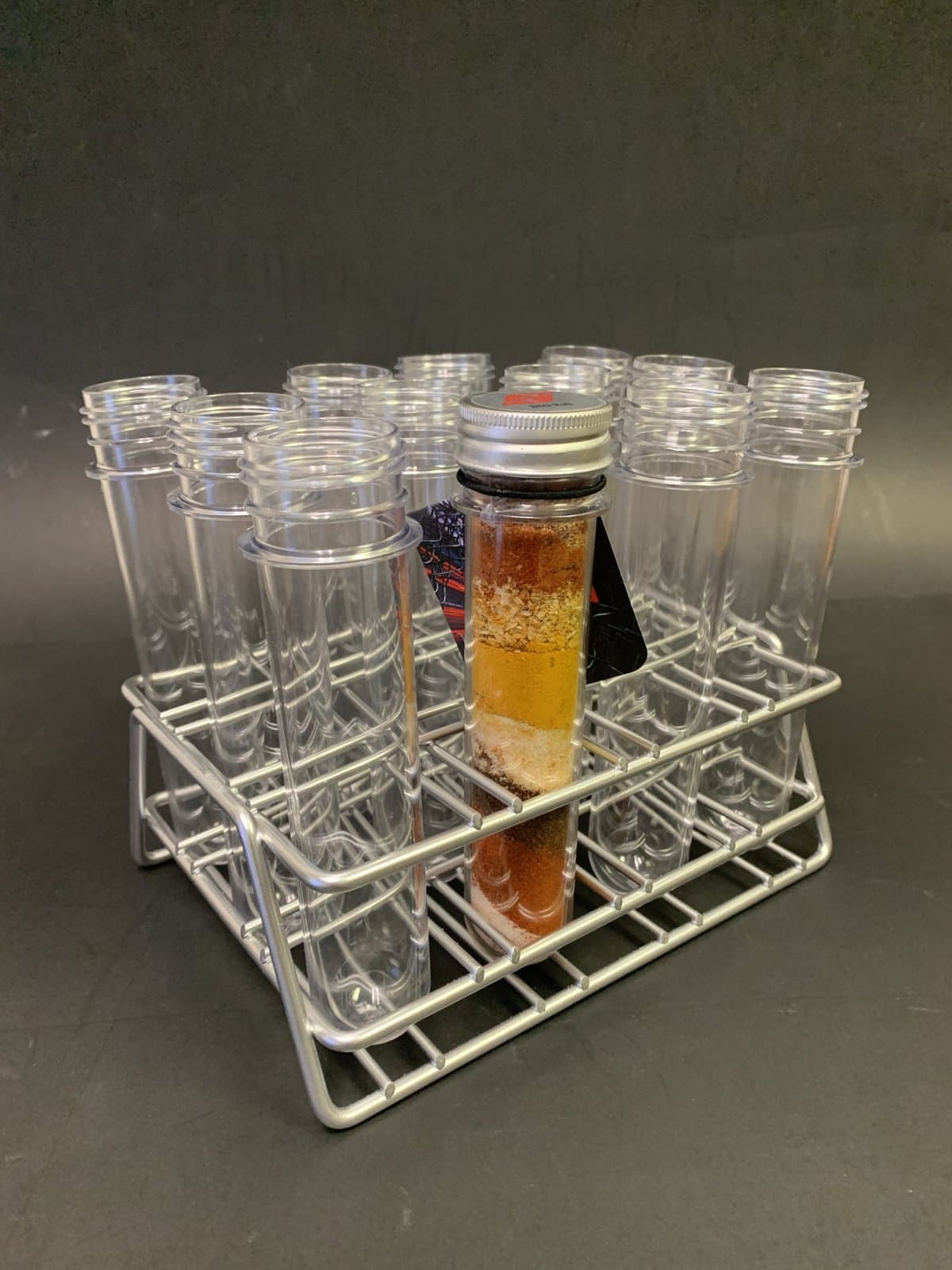 Wire test tube rack holding clear tubes